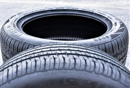 A pair of 2(2) 225/40R20 101W XL AS A/S performance tires